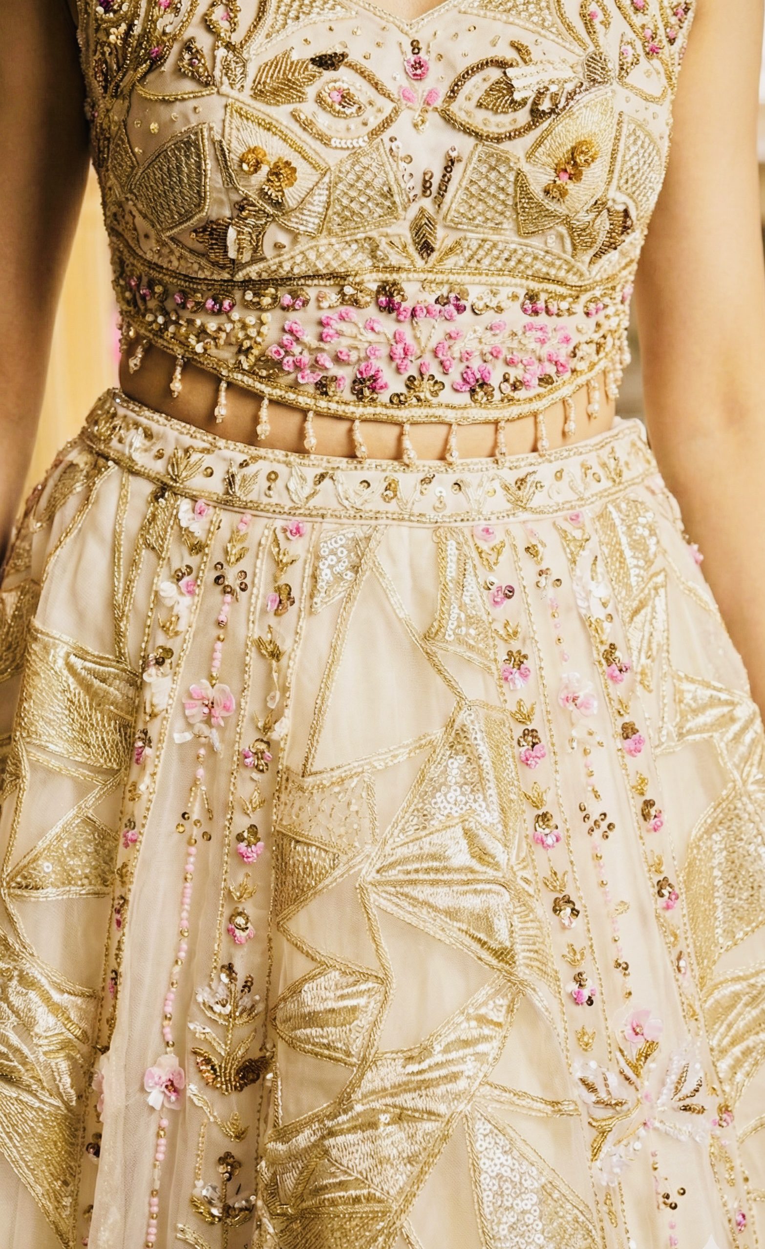 cream and gold reshon embroidered designer lehenga